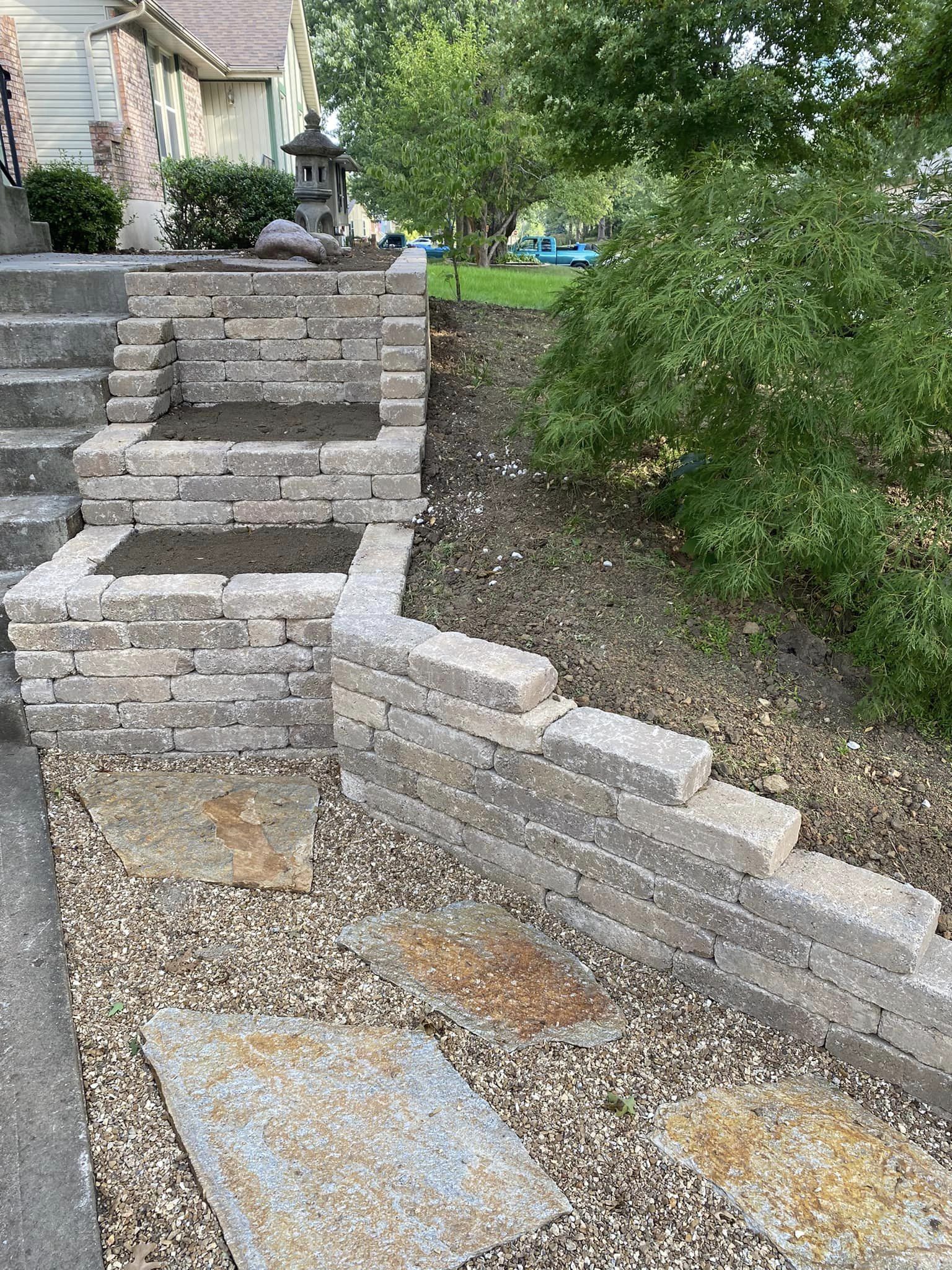 Layered stone work next to stairs